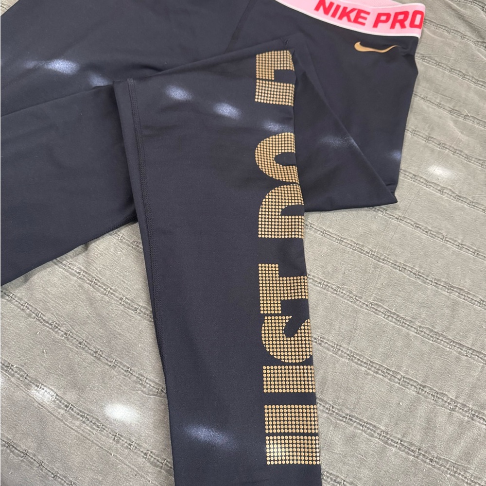 Women’s Nike Black Leggings with Gold Accents